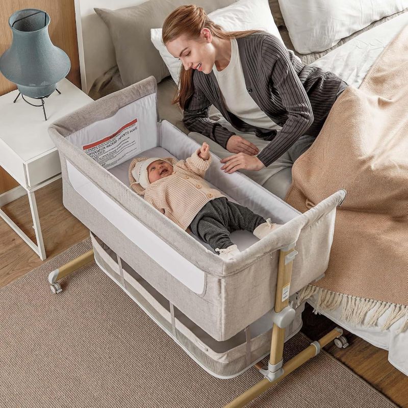Photo 1 of  Baby Bassinet Bedside Sleeper, besrey Bedside Bassinet for Newborn Infant with Comfy Mattress, 9 Height Positions, Adjustable Bedside Crib with 360° Swivel Wheels Bassinet for Baby with Storage Basket 