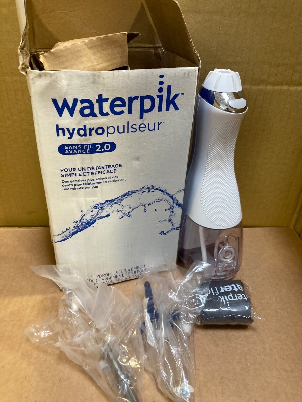 Photo 1 of Waterpik Cordless Advanced 2.0 Water Flosser For Teeth, Gums, Braces, Dental Care With Travel Bag and 4 Tips, ADA Accepted, Rechargeable, Portable, and Waterproof, White WP-580, Packaging May Vary