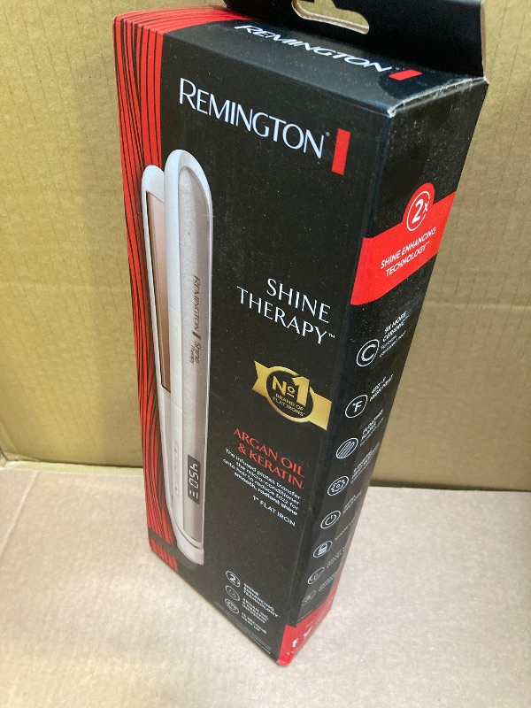 Photo 1 of Remington Shine Therapy 1 inch Hair Straightener Iron, Flat Iron Infused with Argan Oil & Keratin, Professional Ceramic Flat Iron for Less Frizz, Shines and Smooth, Styling Tools***factory sealed