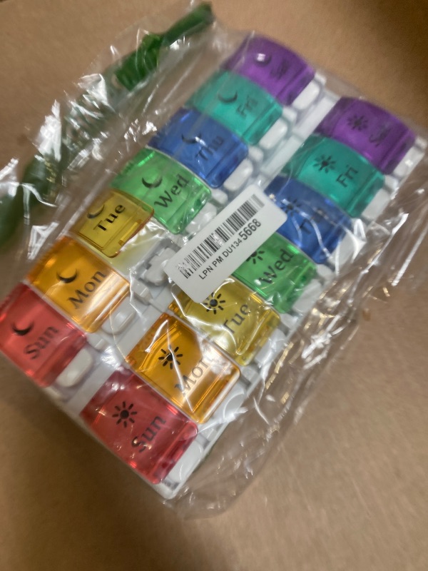 Photo 1 of EZY DOSE Weekly (7-Day) Pill Case, Medicine Planner, Vitamin Organizer, 2 Times a Day AM/PM, Removeabale Trays, Large Push Button Compartments, Easy to Use, Arthritis Friendly, Rainbow Lids, BPA Free