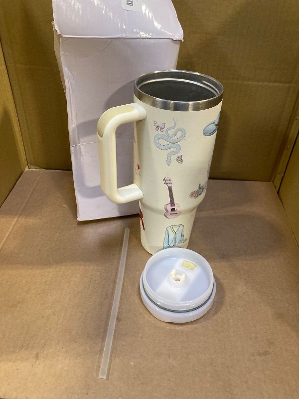 Photo 1 of WALLFID 40oz Tumbler with Handle and Straw,Stainless Steel Insulated Water Cup,Reusable Leakproof Large Capacity Tumbler for Juice Coffee,Great Gift for Teens and Singer Lovers (Lid A)