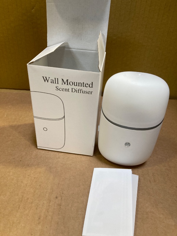 Photo 1 of Kuandawei Plug in Waterless Diffuser, Up to 500 Sq. FT Coverage, Essential Oil Diffuser for Home, Office, Hotel, Small Wall Silent & Waterless Oil Diffuser for Scent Air