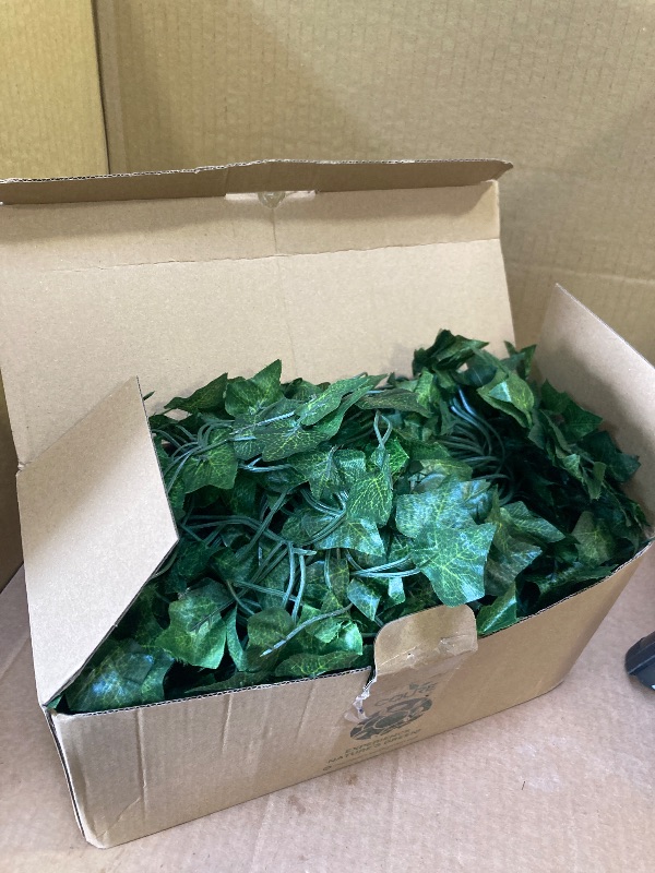 Photo 1 of CQURE 48 Pcs 336Ft Artificial Ivy Fake Vines,Ivy Garland Greenery Garland Fake Hanging Plants Vines Green Leaves for Bedroom Wedding Garden Wall Room Decor