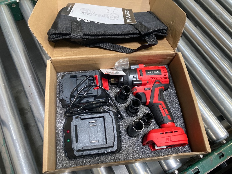 Photo 1 of SEYVUM Impact Wrench,1/2" Impact Gun, Power Impact Driver Max Torque 320 Ft-lbs (430N.m), Cordless Impact Wrench with 20V Brushless Motor, 3.0Ah Li-ion Battery with Fast Charger, 4 Pcs Impact Sockets
