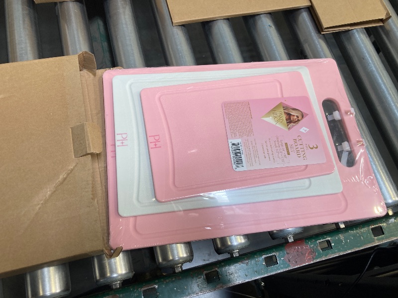 Photo 1 of Paris Hilton Cutting Boards, Dual-Sided Cutting Board Set with Built-in Juice Grooves, Easy-Grip Handles, Heavy-Duty Plastic Made without BPA, Dishwasher Safe, 3-Piece Set, Pink and Cream