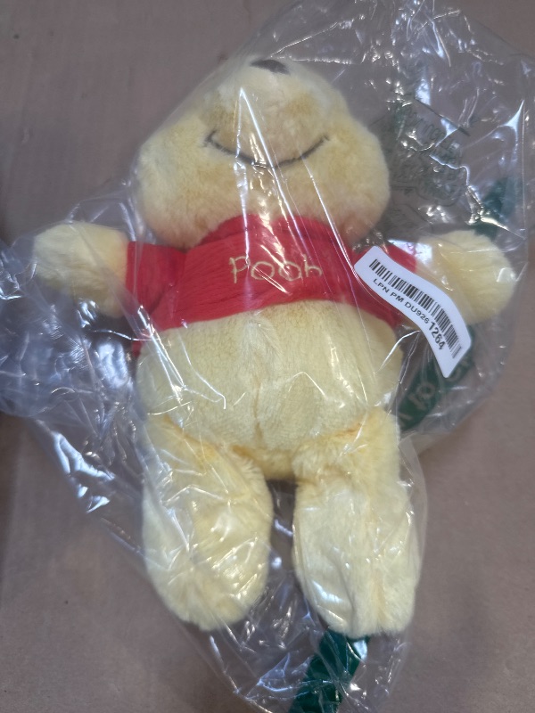 Photo 1 of Kids Preferred Disney Baby Winnie the Pooh and Friends Stuffed Animal with Jingle and Crinkle, Pooh 12”