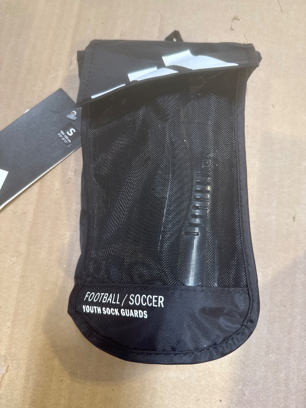 Photo 1 of adidas Unisex-Child Performance Youth Sock Shin Guards, Black/White, Small