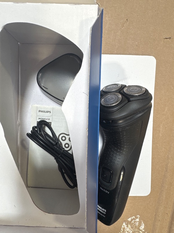 Photo 1 of Philips Norelco Shaver 2400 Series, Wet and Dry Electric Shaver, Pop-up Trimmer, P-Cap, Deep Black, Model X3001/90