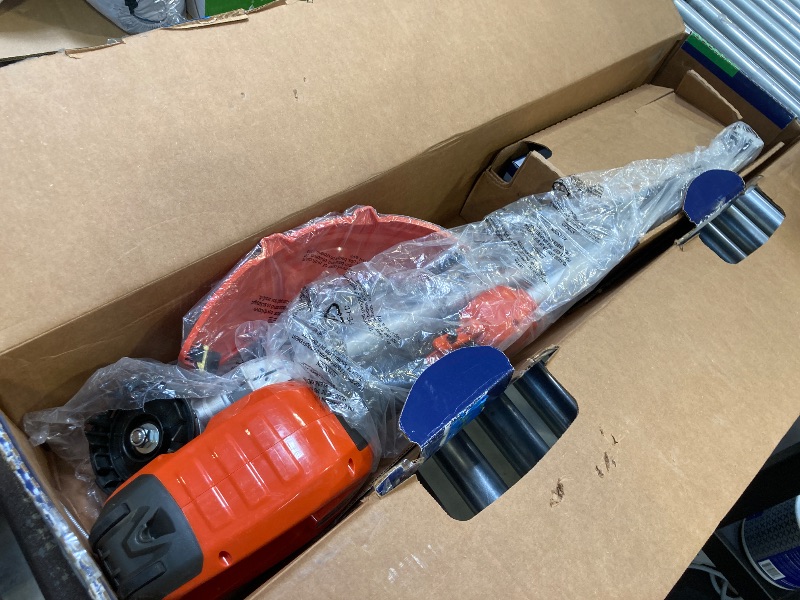 Photo 1 of Husqvarna 330iKL Combi Switch + String Trimmer Attachment, Electric String Trimmer with 4 Ah Battery and Charger Included