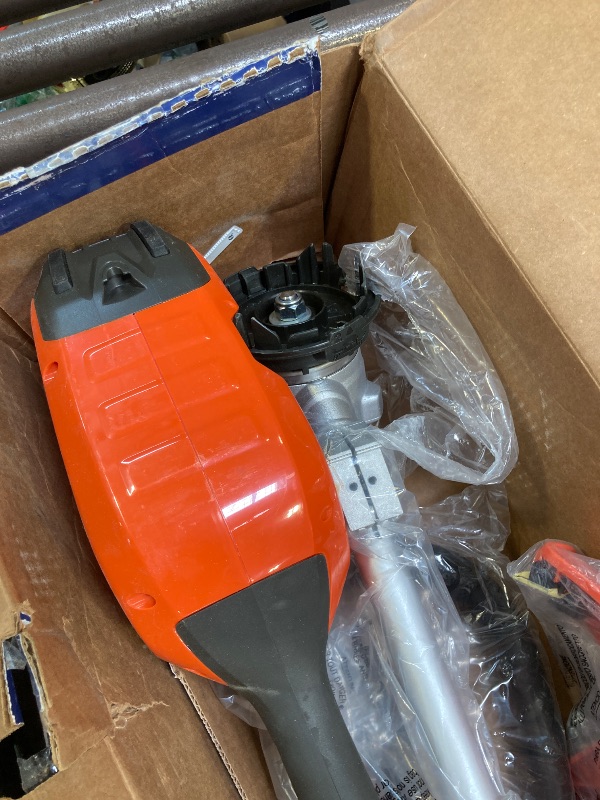 Photo 1 of Husqvarna 330iKL Combi Switch + String Trimmer Attachment, Electric String Trimmer with 4 Ah Battery and Charger Included