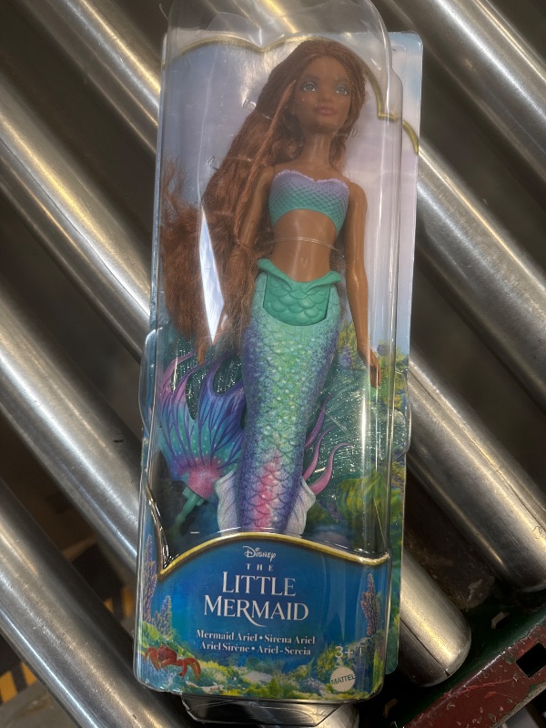 Photo 1 of Mattel Disney Toys, Ariel Fashion Doll with Signature Outfit, Inspired by Disney’s The Little Mermaid Movie