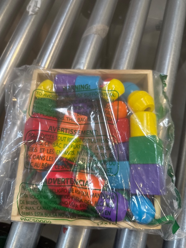 Photo 1 of Melissa & Doug Primary Lacing Beads - Educational Toy With 30 Wooden Beads and 2 Laces For Toddlers, Fine Motor Skills Lacing Toys For Toddlers And Kids Ages 3+