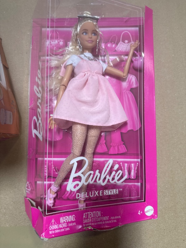 Photo 1 of Barbie Deluxe Style Doll #3 in Barbiecore Outfit, Blond Hair in Top Knot, Pink Pastel Dress with Oversized Bow and Accessories Like Mesh Tights