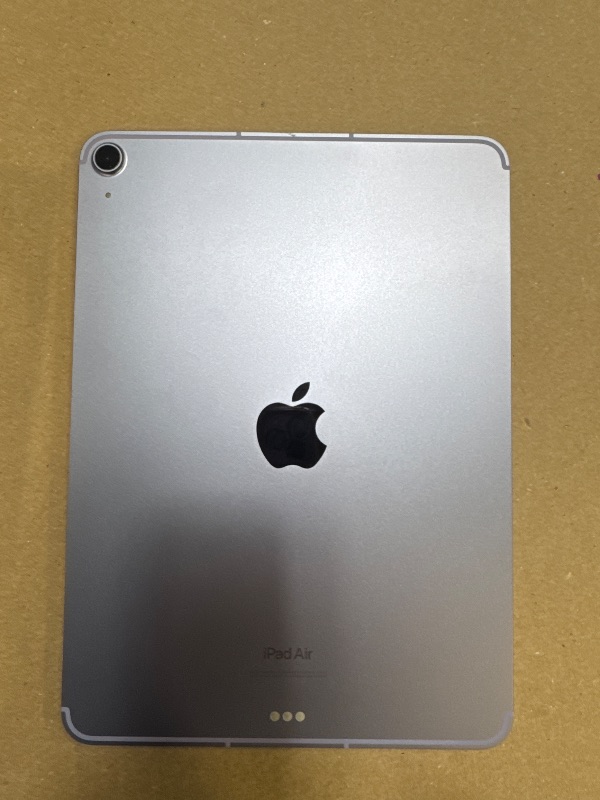 Photo 1 of Apple iPad Air (5th Generation): with M1 chip, 10.9-inch Liquid Retina Display, 256GB, Wi-Fi 6 + 5G Cellular, 12MP front/12MP Back Camera, Touch ID, All-Day Battery Life – Purple