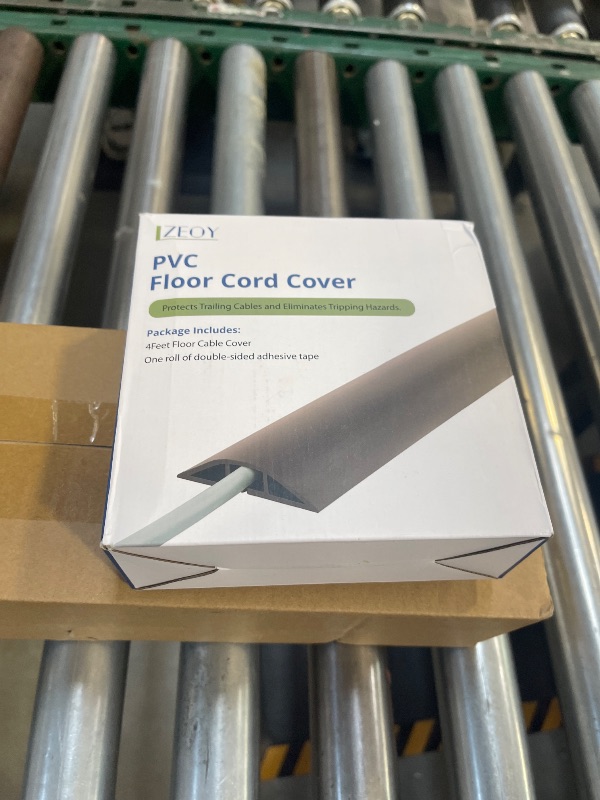Photo 1 of LZEOY 4FT Cord Cover Floor, Extension Brown Cord Hider Floor, Power Cable Cover Cord Protector, Soft PVC Wire Covers for Cords, Cable Management Hide Cords - Cavity: 0.47" (W) x 0.24" (H)