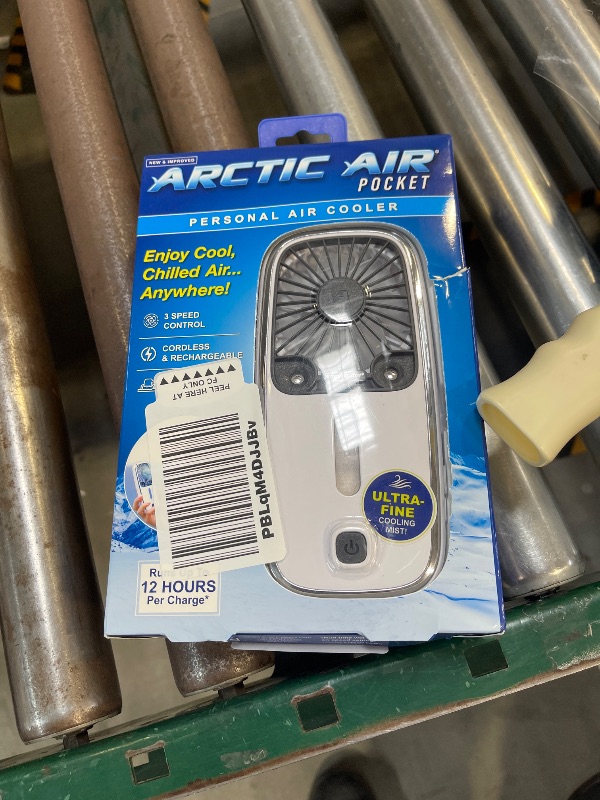 Photo 1 of Arctic Air Pocket Small Portable Fan, Powerful, Personal Air Cooler with 3 Adjustable Speeds, 12-Hour Battery Life, Hand Fan for Indoor and Outdoor Use