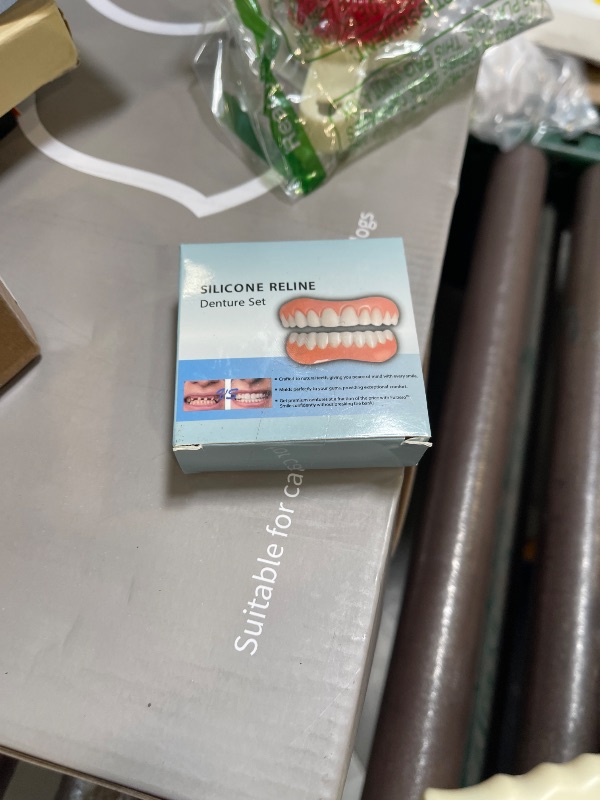 Photo 1 of Moldable False Teeth