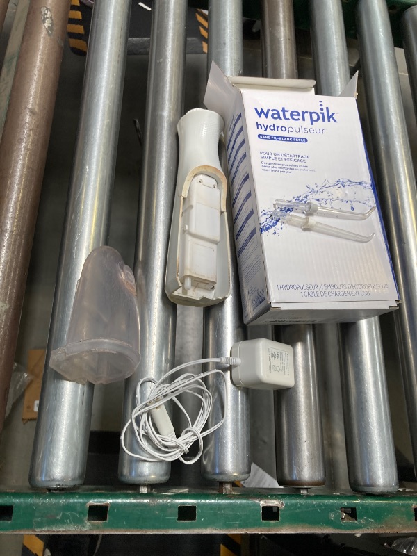 Photo 1 of Waterpik Cordless Pearl Rechargeable Portable Water Flosser for Teeth, Gums, Braces Care and Travel with 4 Flossing Tips - ADA Accepted, WF-13 White,