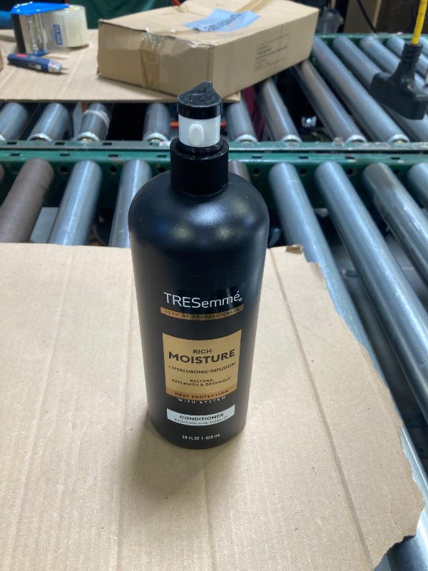 Photo 1 of TRESemmé Rich Moisture Conditioner for Dry Hair Rich Moisture Hydrating Conditioner Formulated With Vitamin E and Biotin 28 oz 