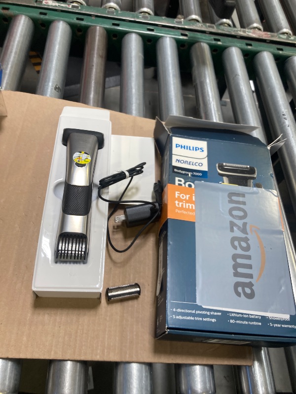Photo 1 of Philips Norelco Bodygroom 7000 Series, Showerproof Groin and Body Trimmer for Men, Precise Body Grooming, Adjustable Comb, Safe Even Below The Belt, 80 Min. Runtime, Model BG7030/49