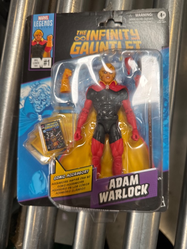 Photo 1 of Marvel Legends Series Adam Warlock, Infinity Gauntlet Comics-Inspired Collectible 6-Inch Scale Action Figure with Character-Sized Comic Accessory