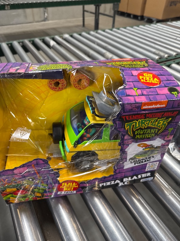 Photo 1 of Teenage Mutant Ninja Turtles Toy, Pizza Blaster RC Vehicle with 6 Foam Pizza Launchers, TMNT Remote Control Toy for Kids, Mutant Mayhem, Ages 5+