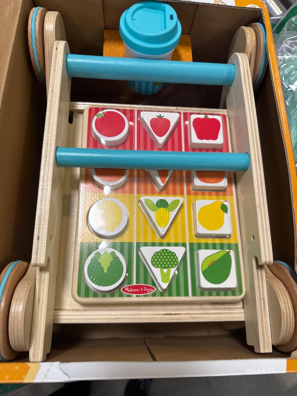Photo 1 of Melissa & Doug Wooden Shape Sorting Grocery Cart Push Toy and Puzzles - Pretend Play Grocery Toys, Sorting And Stacking Toys For Infants And Toddlers Ages 1+ - FSC-Certified Materials