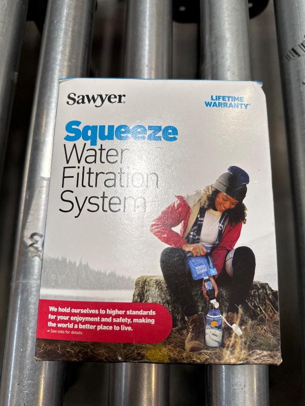 Photo 1 of Sawyer Products SP129 Squeeze Water Filtration System w/ Two 32-Oz Squeeze Pouches, Straw, and Hydration Pack Adapter