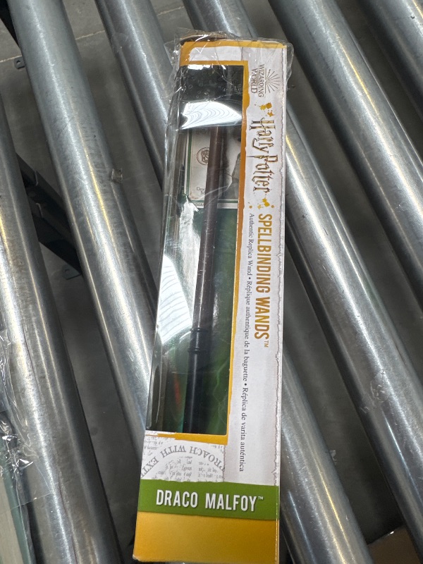 Photo 1 of Wizarding World Harry Potter, 12-inch Spellbinding Draco Malfoy Magic Wand with Collectible Spell Card, Kids Toys for Ages 6 and up