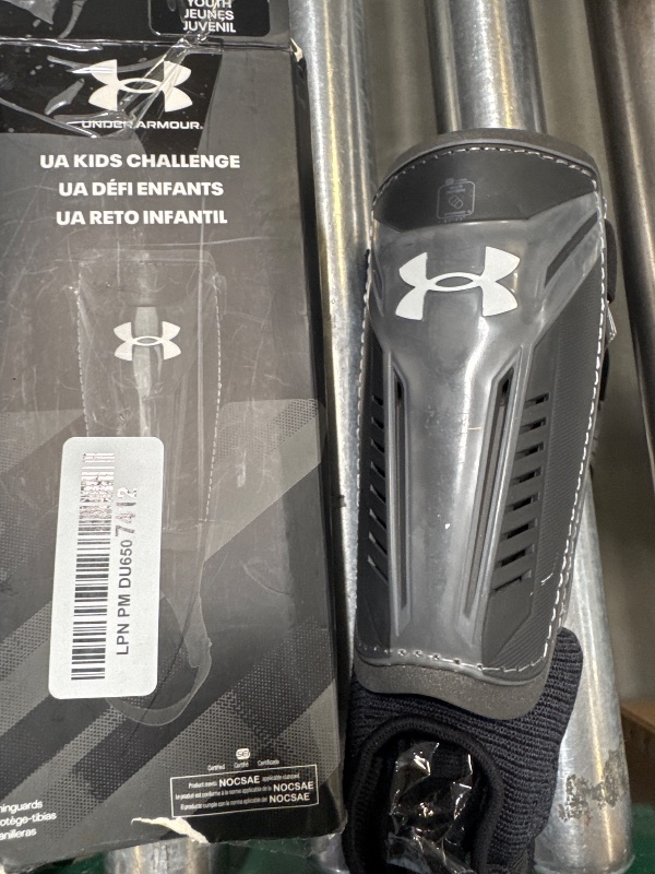Photo 1 of UA Challenge Shin Guard YTH Black/Castle Rock L