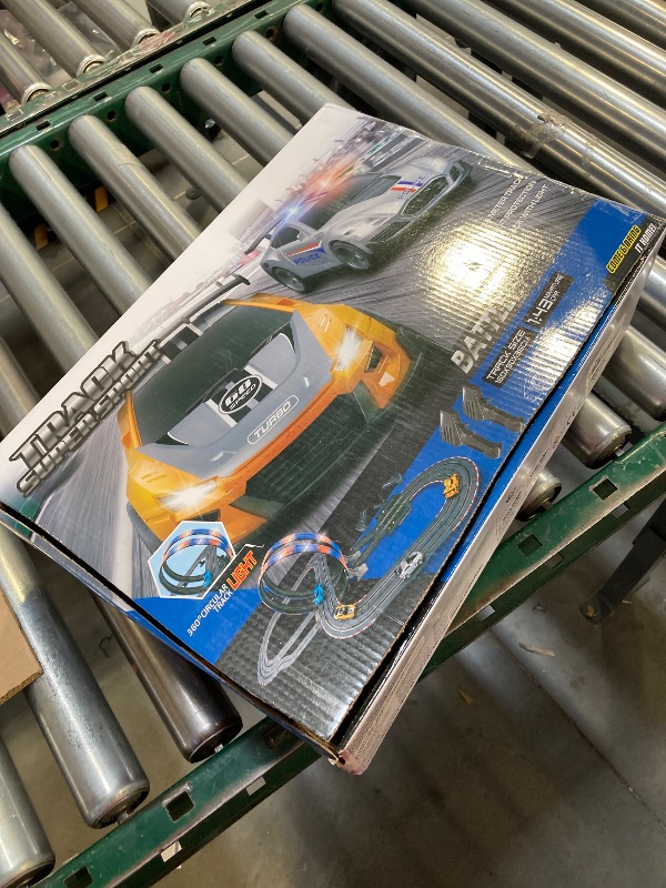 Photo 1 of Slot Car Race Track Sets with 4 Slot Cars, 20ft Race Car Track for Boys and Kids, Dual Racing Game Lap Counter Circular Overpass Track, Gifts Toys for Boys Kids Age 6 7 8-12