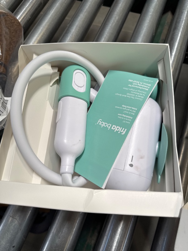 Photo 1 of Frida Baby Control The Flow Bathtub Sprayer Attachment for Baby Bathtub, Shower Head with Scalp Massager, Control Waterflow with 2 Pressure Modes