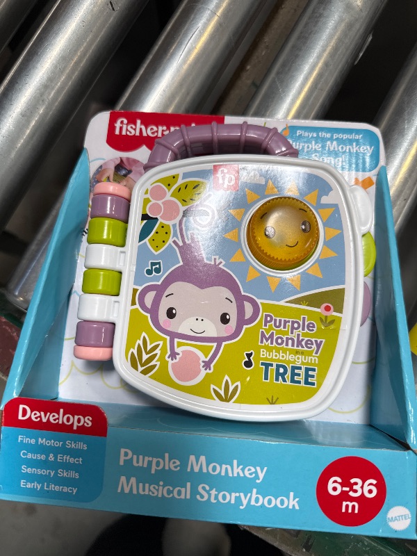 Photo 1 of Fisher-Price Baby Toy Purple Monkey Musical Storybook with Lights & Sounds for Infants & Toddlers Ages 6+ Months