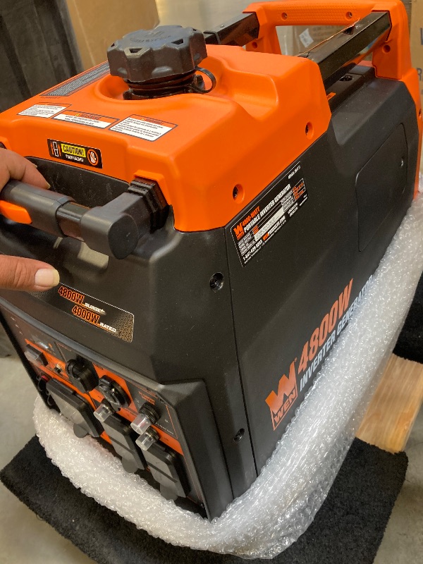 Photo 1 of WEN 56477i 4800-Watt Portable Inverter Generator, 72.7 pounds
