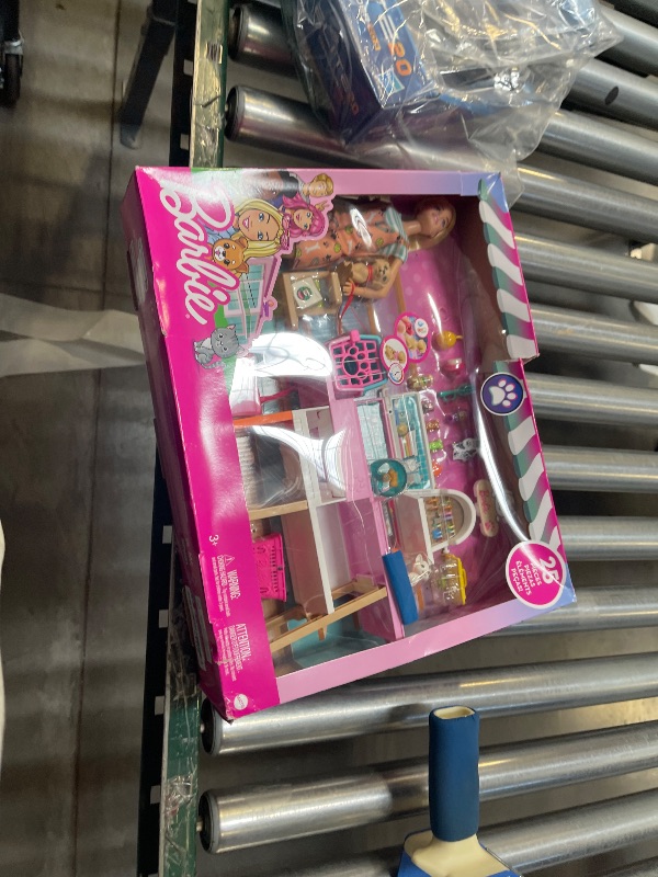 Photo 1 of Barbie Doll & Playset, Pet Boutique with 4 Pets, Color-Change Grooming Feature & 20+ Themed Accessories