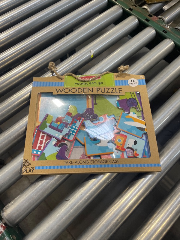 Photo 1 of Melissa & Doug Natural Play Wooden Puzzle: Ready, Set, Go (Four 4-Piece Vehicle Puzzles)