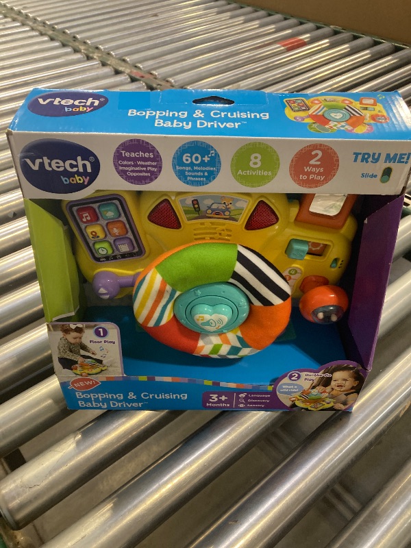 Photo 1 of VTech Baby Bopping and Cruising Baby Driver