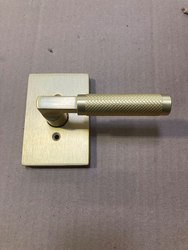 Photo 1 of Kwikset Prava Interior Passage Door Knurled Handle, Lever for Closet and Hallway Doors, Reversible Non-Locking Handle Lever, Satin Brass, with Microban Protection 1 Pcs