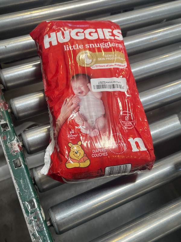 Photo 1 of Huggies Newborn Diapers, Little Snugglers Baby Diapers, Size Newborn (up to 10 lbs), 31 Count