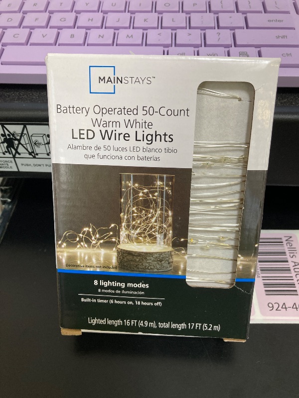 Photo 1 of Mainstays Battery-Operated Indoor 50-Count LED Warm White Wire Lights, with 8 Lighting Modes, 4.5 Volts