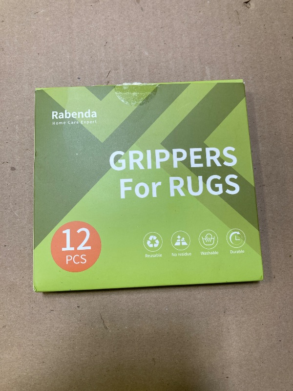 Photo 1 of Rabenda 12 Pcs Rug Tape, Non Slip Rug Pads Grippers for Hardwood Floors and Tiles, Reusable Carpet Tape for Area Rugs, Double-Sided Adhesive Rug Stickers Keep Corners Flat (Black)