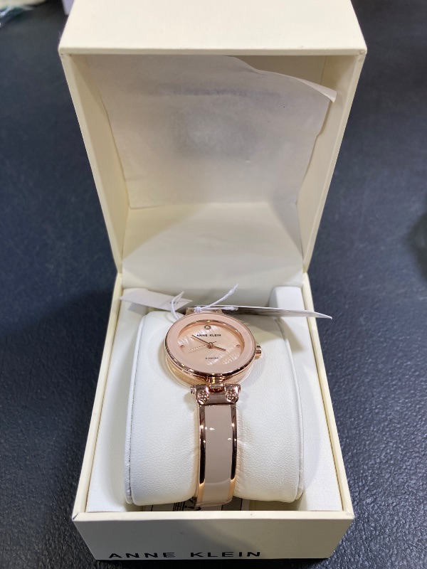Photo 1 of Anne Klein Women's Genuine Diamond Dial Bangle Watch