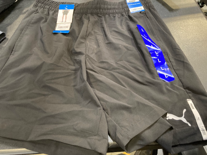 Photo 1 of PUMA Men's Lightweight Active Woven Short (US, Alpha, Large, Regular, Regular, Black)