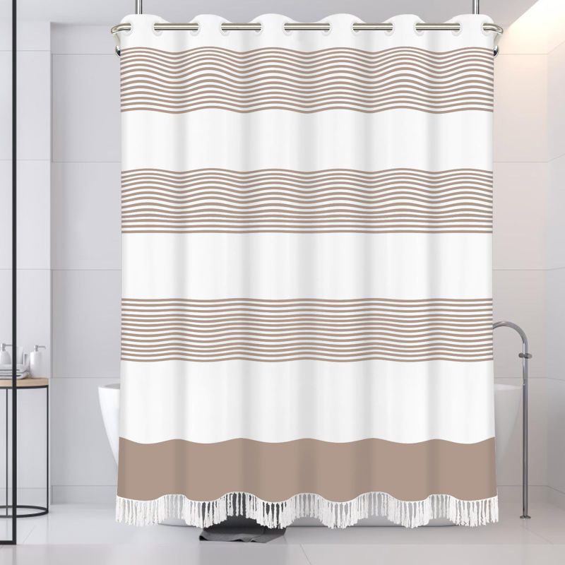Photo 1 of Uphome 72x72 Boho Shower Curtain Black and White Fabric Bathroom Curtains Set with Hooks, Chic Triangle and Geometric Tassel Bath Curtain, Heavy Duty and Waterproof for Modern Hotel Decor