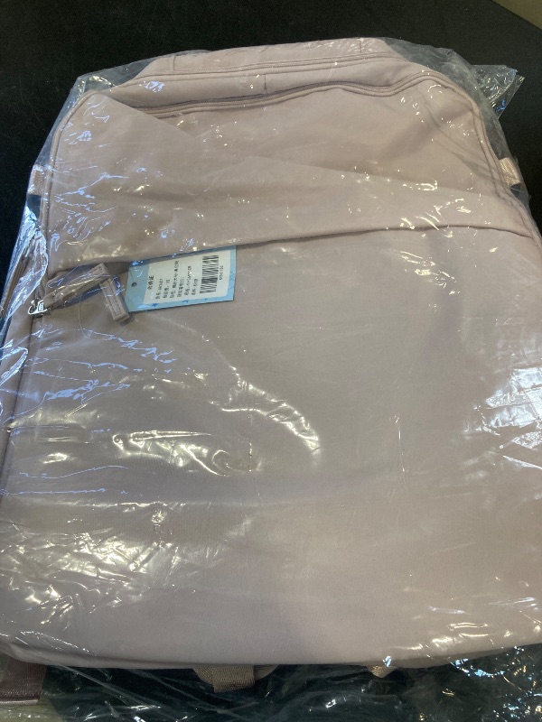 Photo 1 of Vacuum Travel Backpack with Pump for Women, Air back Personal Item Carry on Backpacks Flight Approved 18x14x8 inches for Men, Laptop Waterproof Work Compression bags Casual Daypack, Pink.