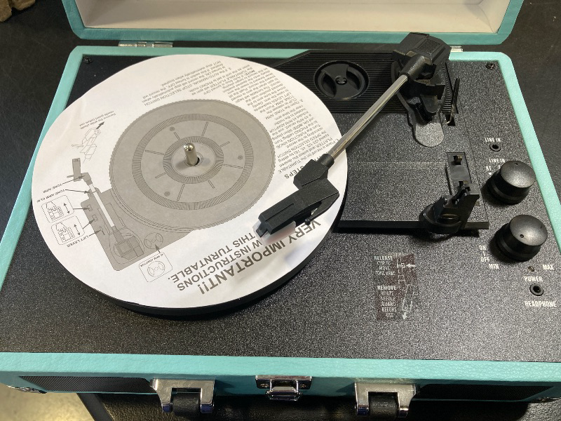 Photo 1 of Victrola Journey Bluetooth Portable Suitcase Record Player – with Built-in Speakers, 3 Speed Vinyl Record Player, RCA Out, Headphone Jack (Turquoise)