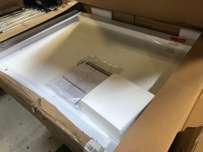 Photo 1 of DreamLine SlimLine 34 in. D x 42 in. W x 2 3/4 in. H Center Drain Single Threshold Shower Base in White, DLT-1134420