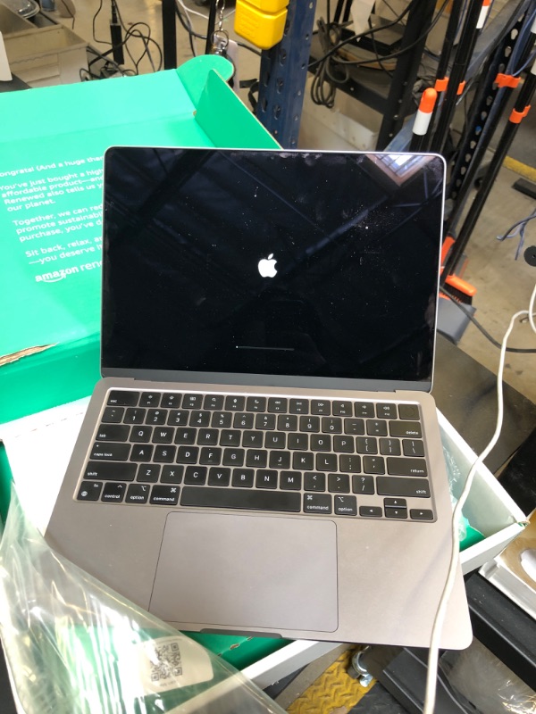 Photo 1 of Apple 2022 MacBook Air M2 Chip (13-inch, 8GB RAM, 256GB SSD Storage) (QWERTY English) Space Gray (Renewed Premium) (USED)