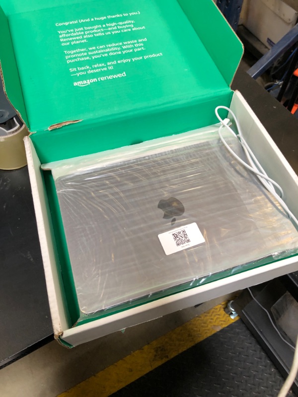 Photo 1 of Apple 2022 MacBook Air M2 Chip (13-inch, 8GB RAM, 256GB SSD Storage) (QWERTY English) Space Gray (Renewed Premium) (USED)
