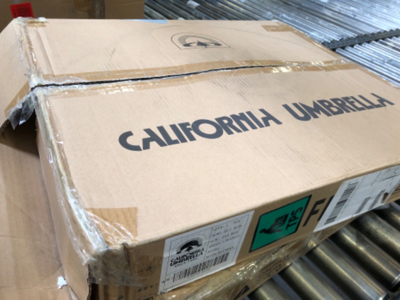 Photo 1 of California Umbrella 50 lbs. Round Concrete Weighted Powdercoated Steel Umbrella Base, White Frame
